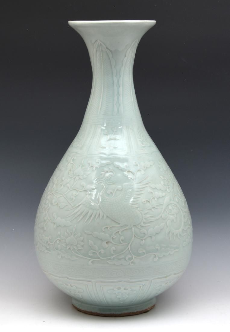 LARGE CARVED CH'ING-PAI WARE