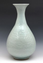 LARGE CARVED CH'ING-PAI WARE Y
