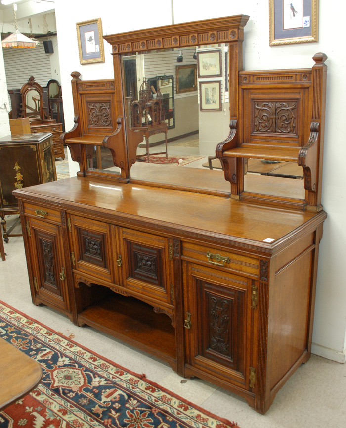 LARGE CARVED OAK SIDEBOARD