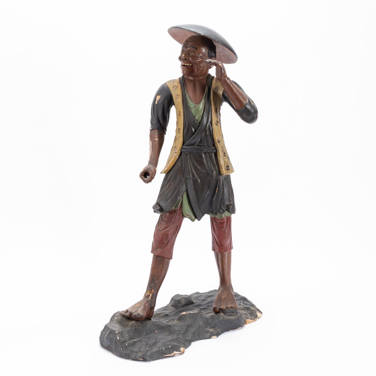 LARGE CARVED STANDING FIGURE OF A
