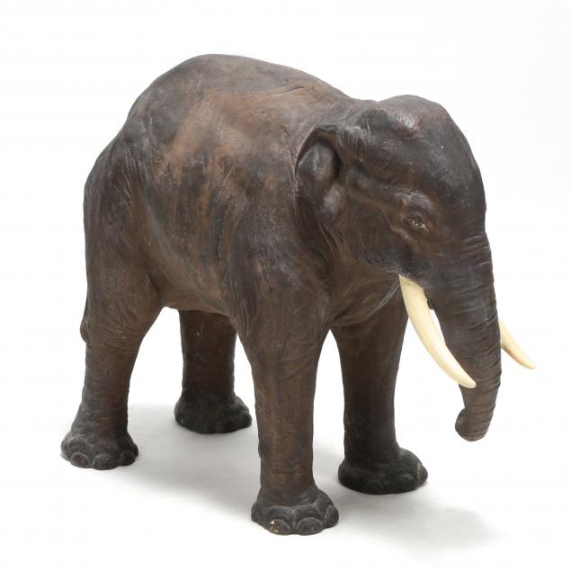 LARGE CAST CERAMIC ELEPHANT WITH J.
