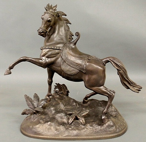 Large cast metal stallion with faux