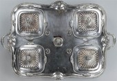 LARGE CRESTED SILVERPLATED BRE
