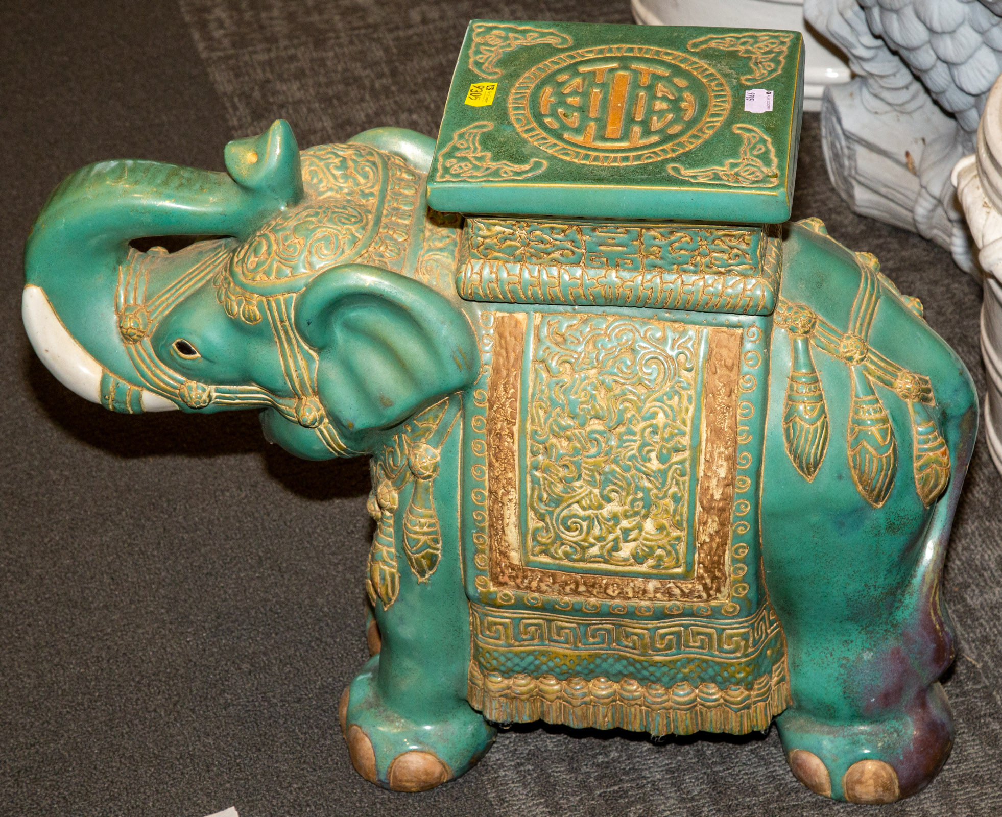 LARGE ELEPHANT FORM PLANT STAND .