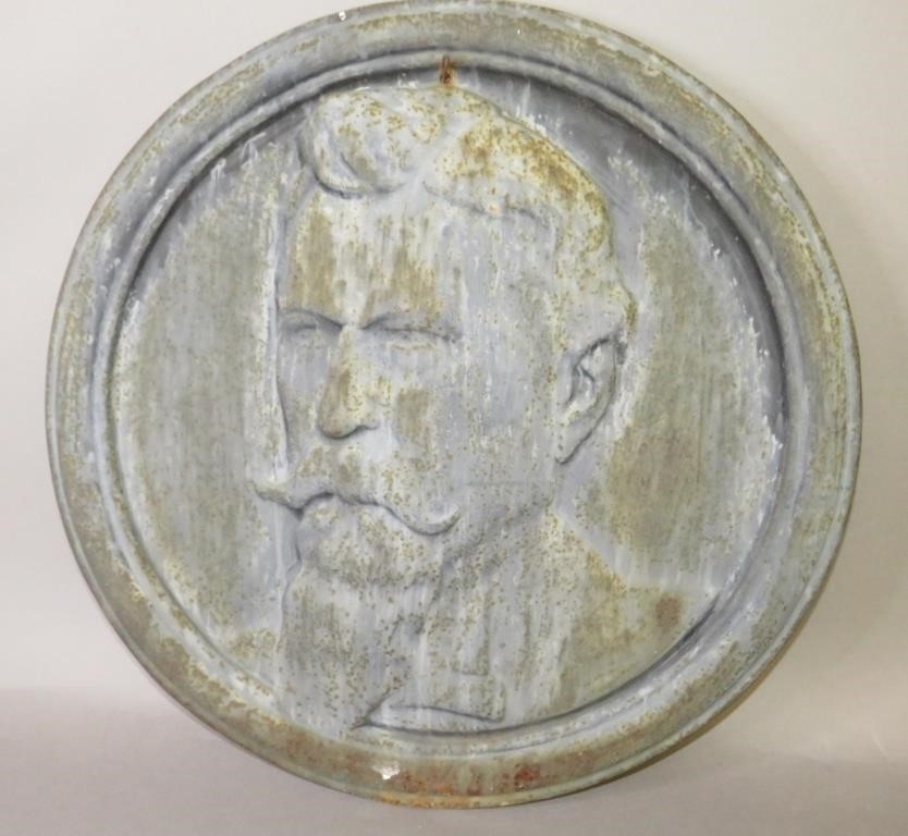 LARGE EMBOSSED CAST IRON ROUND