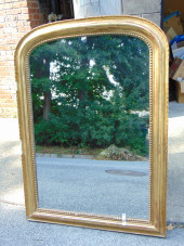 LARGE GILT MIRROR WITH CURVED