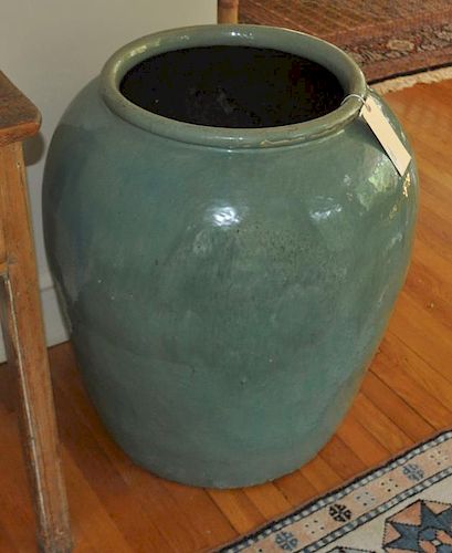LARGE GREEN POTTERY VASEof ovoid