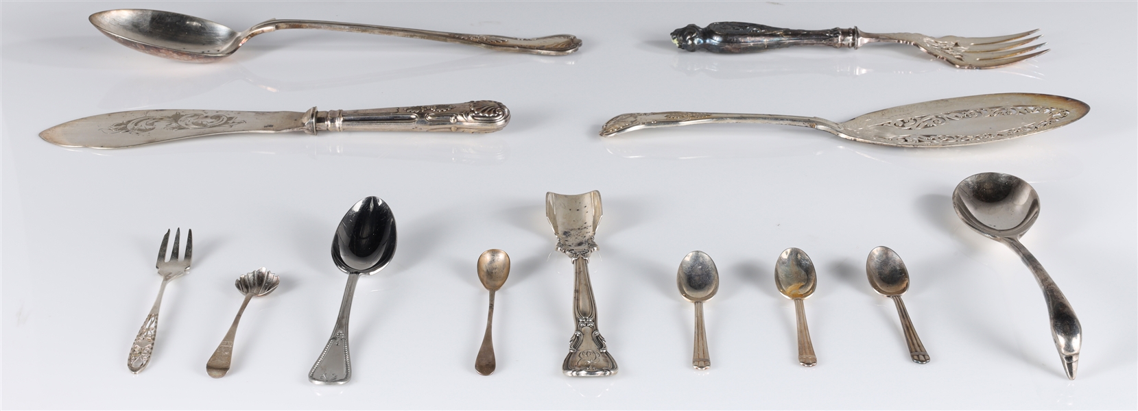 Large group of 38 silver plate
