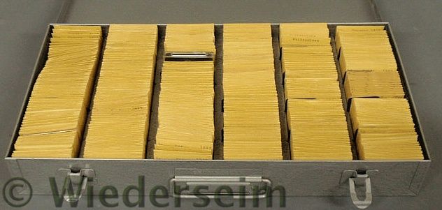 Large group of foreign coins in 2x2