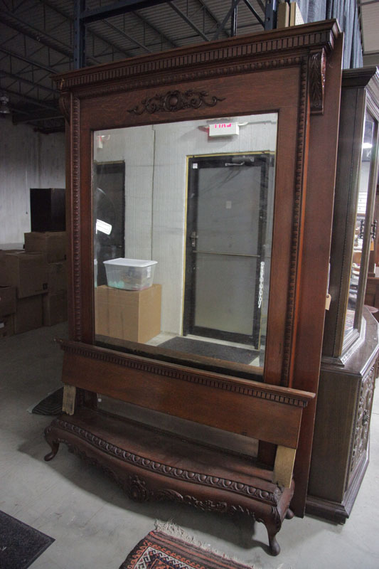 LARGE HALL MIRROR. Oak having a