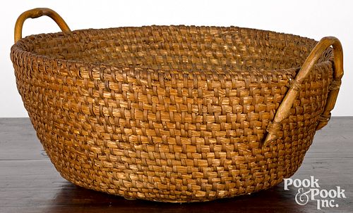 LARGE HANDLED RYE STRAW BASKET,