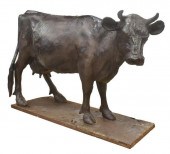 LARGE IRON MILK COW WHISKEY AD