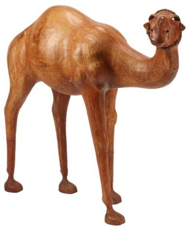 LARGE LEATHER-CLAD FIGURE OF A