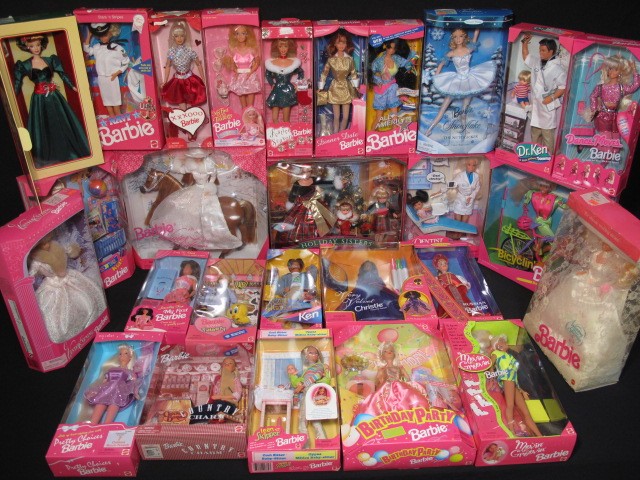 Large lot of 26 Barbie dolls. Never