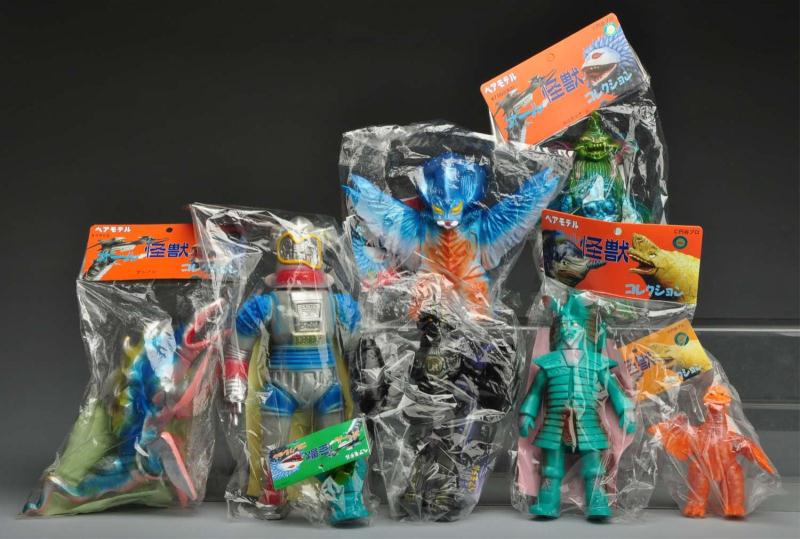 Large Lot of Vinyl Figures. 