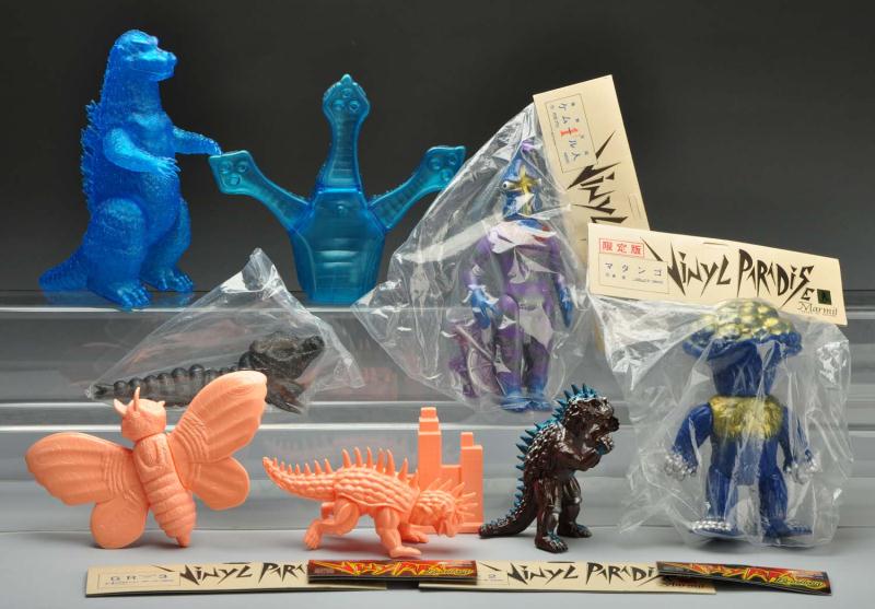Large Lot of Vinyl Figures. 