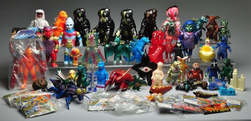 Large Lot of Vinyl Figures. 