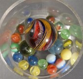 LARGE MARBLE AND A SMALL COLLE