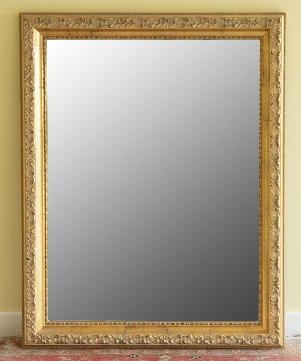 LARGE MIRROR IN MOLDED GOLD FRAME A