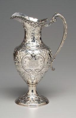 Large ornate sterling water