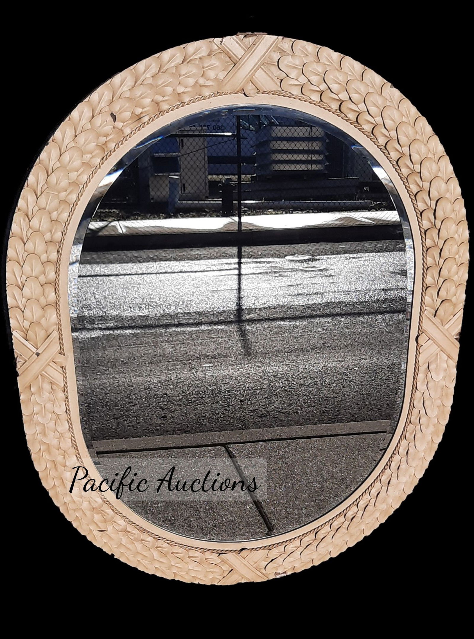 LARGE OVAL BEVELED MIRROR,