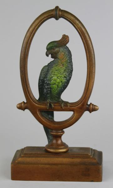 LARGE PARROT IN RING DOORSTOP