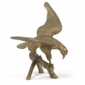 LARGE PATINATED BRASS PERCHING