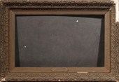 LARGE PLASTER AND WOOD FRAMELa