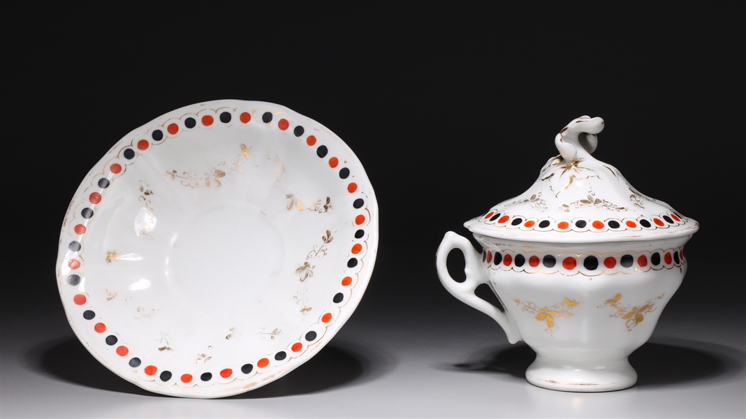 Large porcelain covered cup and
