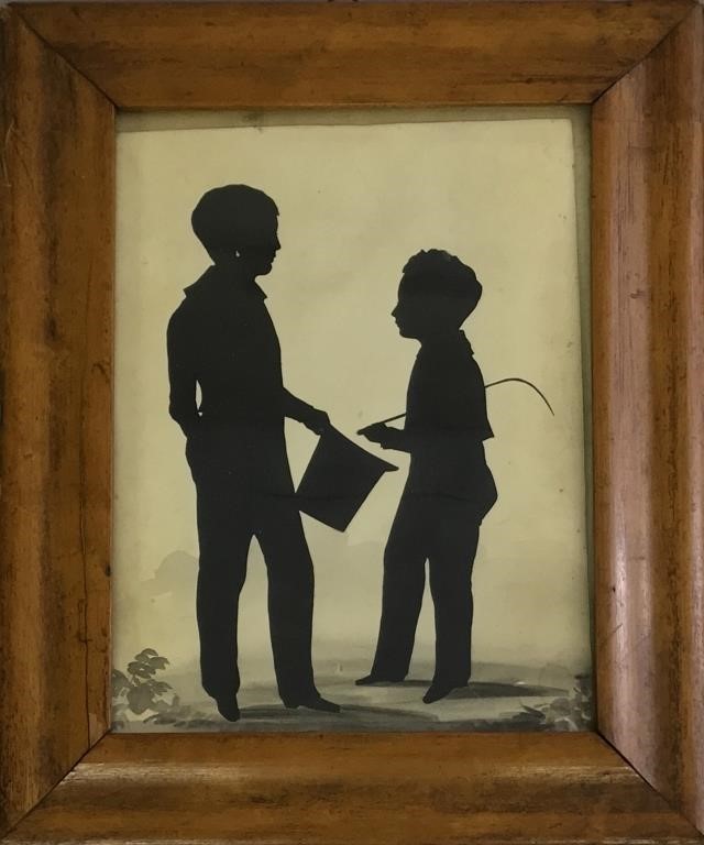 Large silhouette of two boys