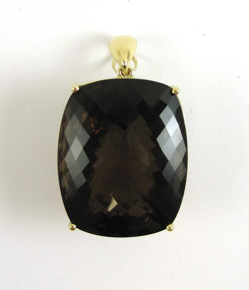 LARGE SMOKY QUARTZ AND FOURTEEN