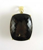 LARGE SMOKY QUARTZ AND FOURTEE