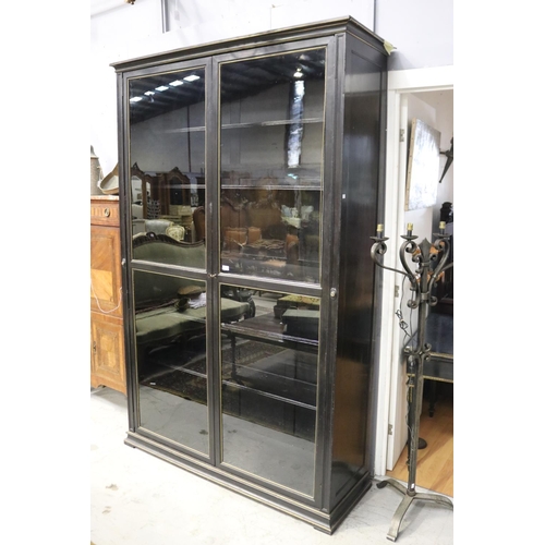 Large two door bookcase, ebonized