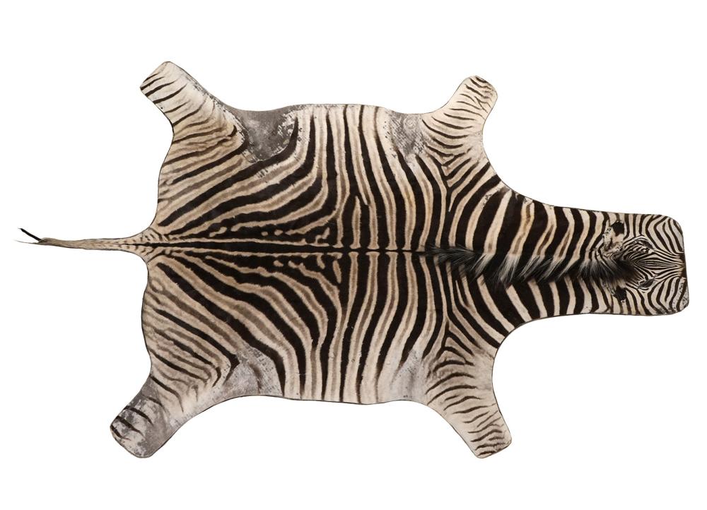 LARGE ZEBRA HIDE RUG WITH FELT