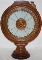 LATE 19TH CENTURY OAK GAMBLING