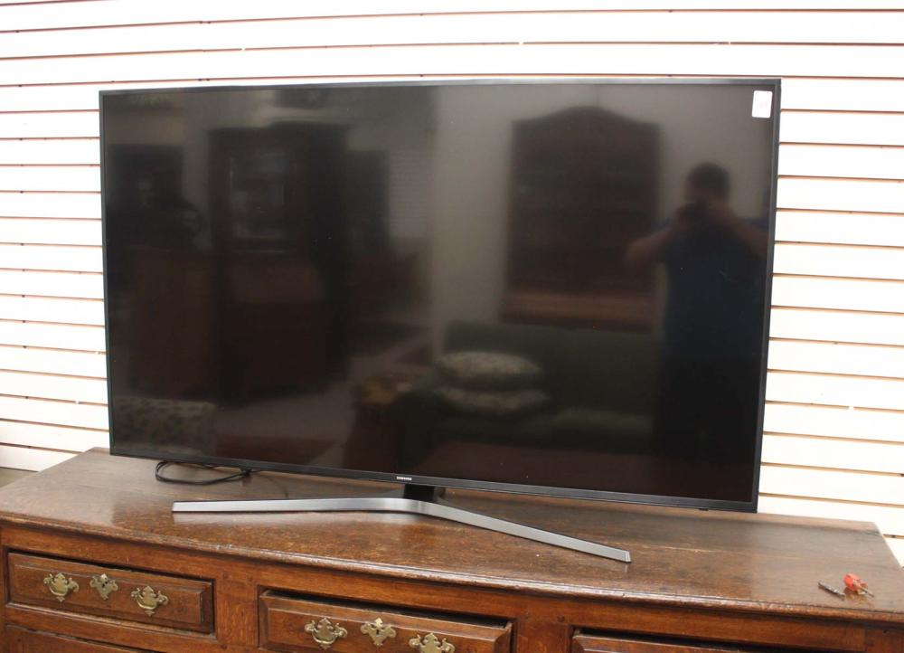 LATE MODEL SAMSUNG 70" UHD TV,