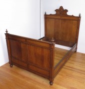 LATE VICTORIAN CARVED OAK BED: