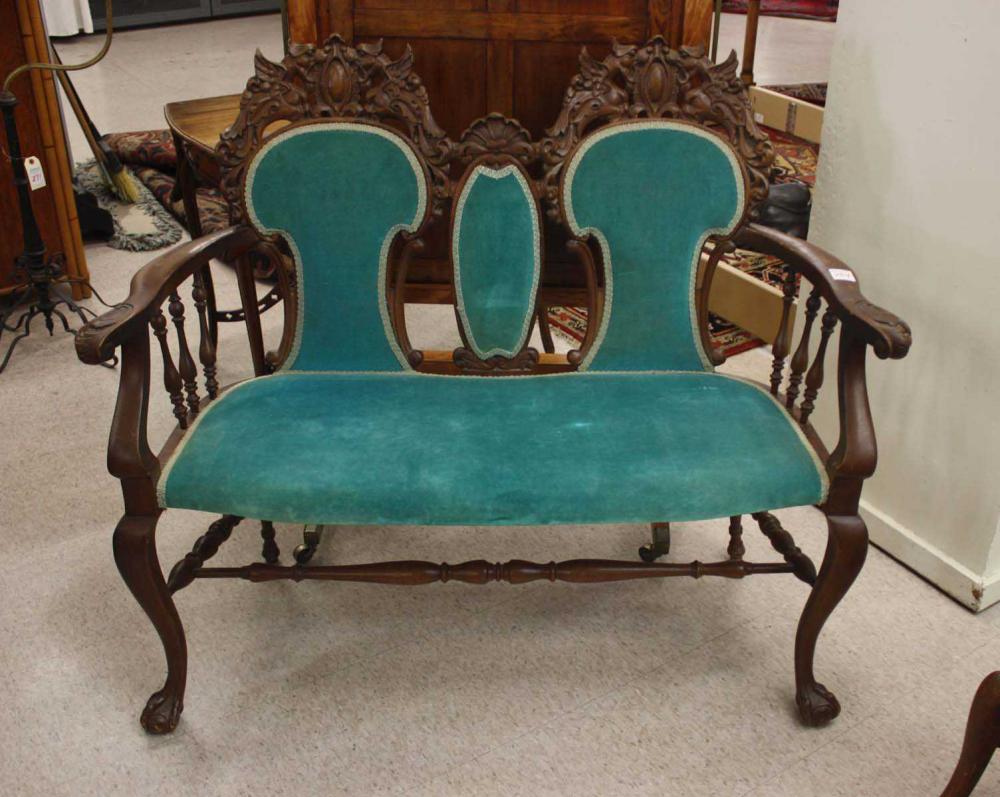 LATE VICTORIAN CARVED OAK SETTEE
