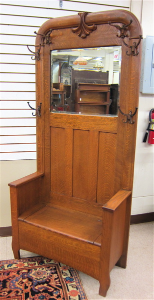 LATE VICTORIAN OAK SETTLE HALLSTAND