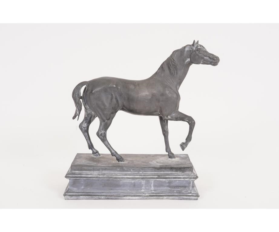 Lead sculpture of a stallion,