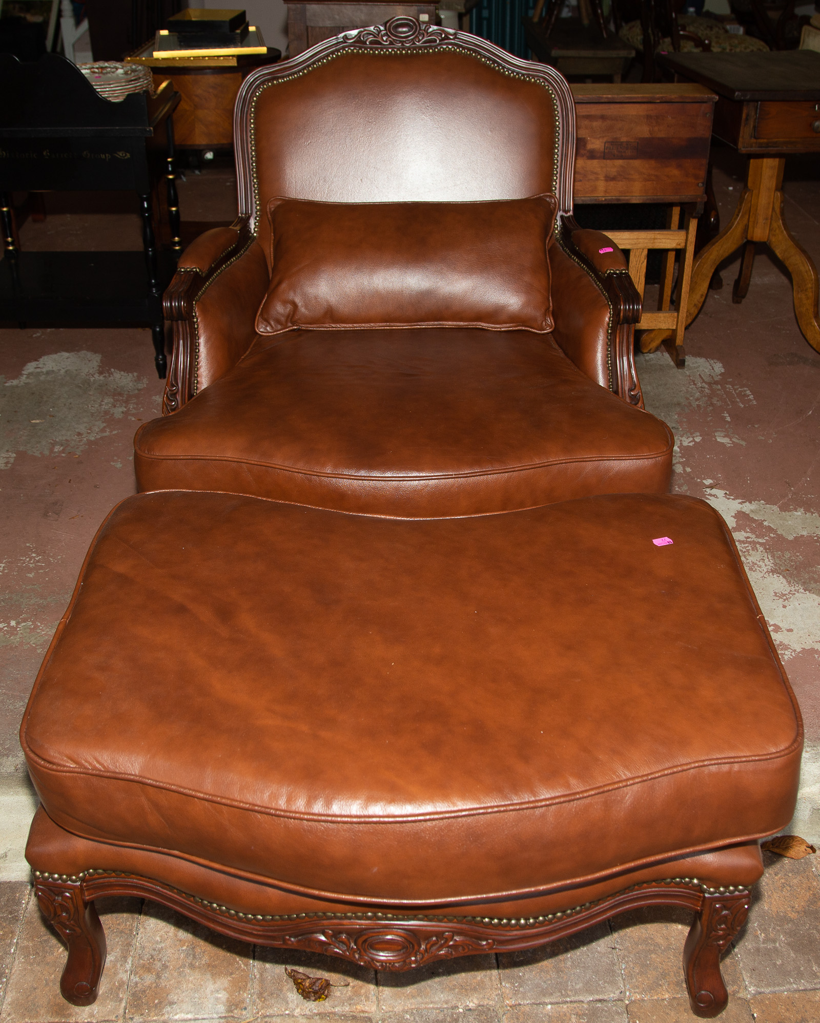 LEATHER ARMCHAIR WITH OTTOMAN