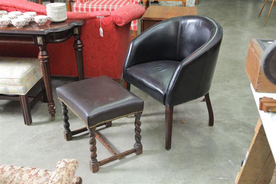 LEATHER CHAIR AND OTTOMAN. Barrel