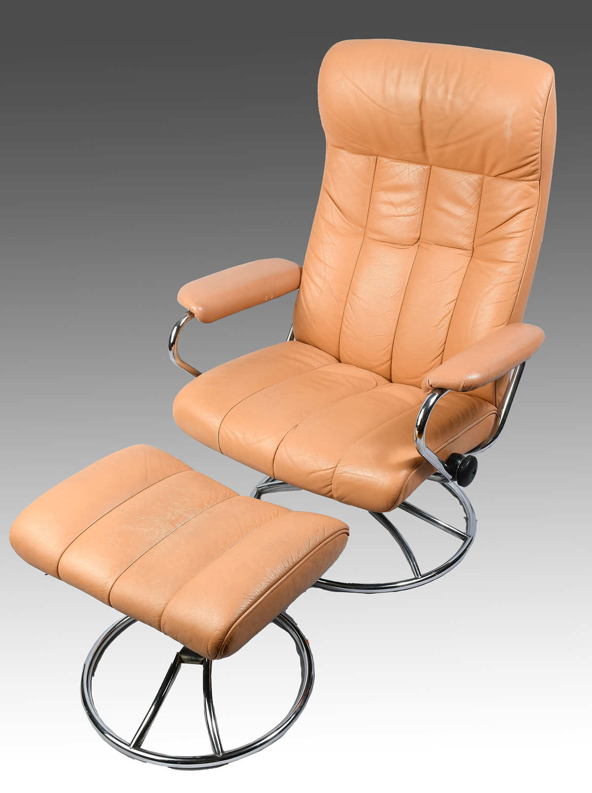 LEATHER CHAIR AND OTTOMAN: