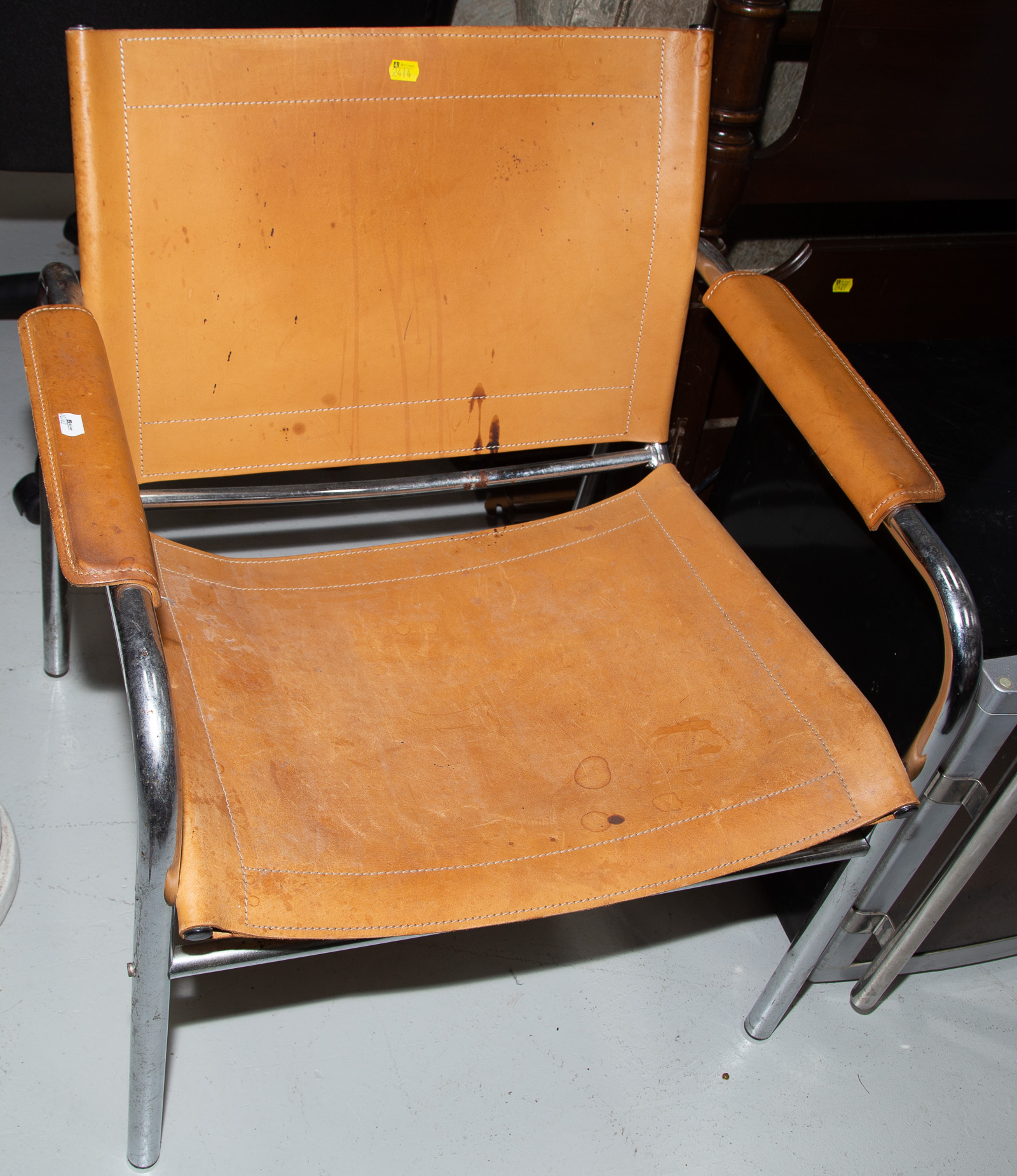 LEATHER & CHROME ARM CHAIR .