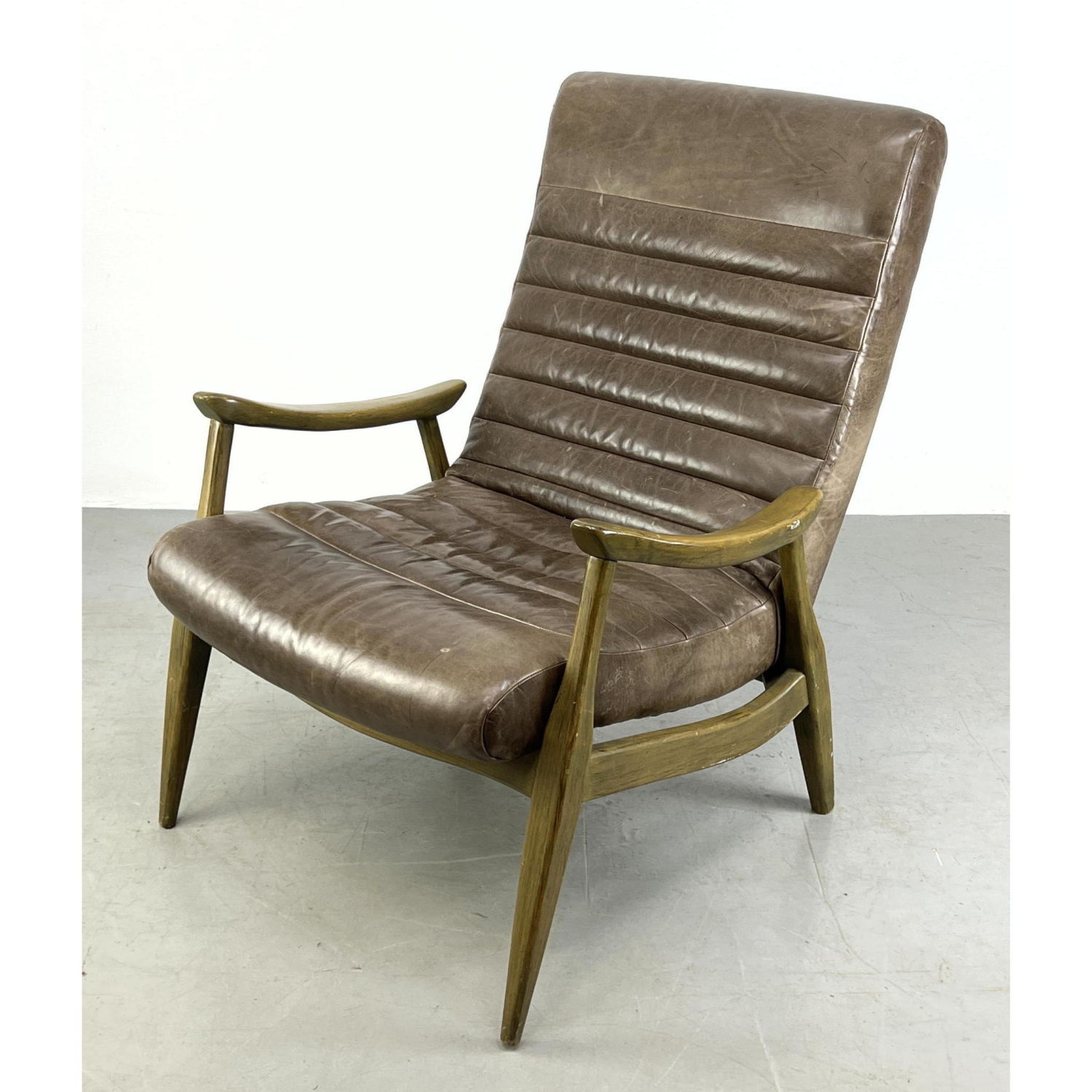 Leather Tall Back Lounge Chair.