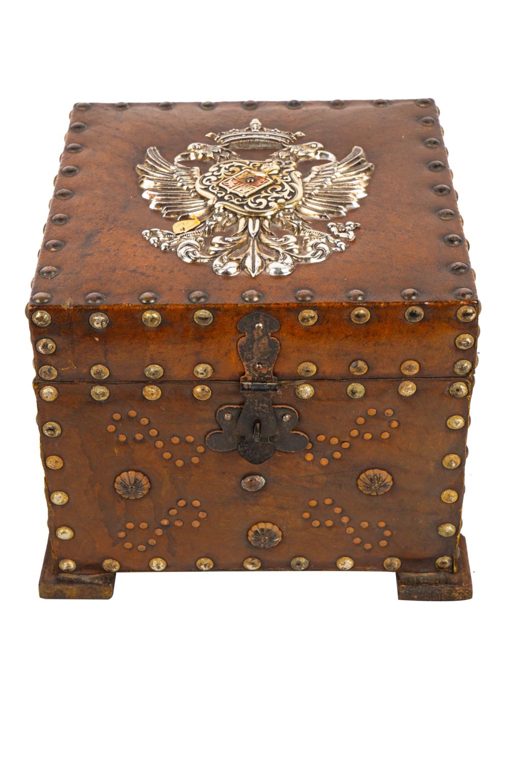 LEATHER WRAPPED COAT OF ARMS