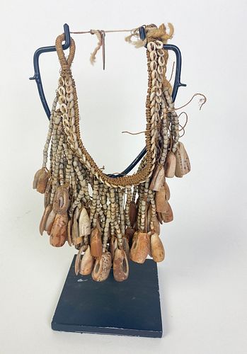 LEG ORNAMENT, WITH WOVEN FIBER