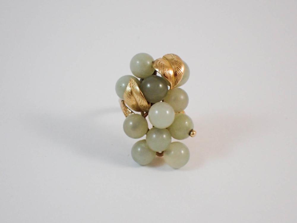 LIGHT GREEN JADE AND FOURTEEN KARAT