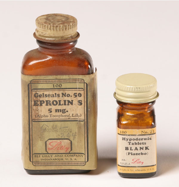 Lilly screw cap medicine bottles;