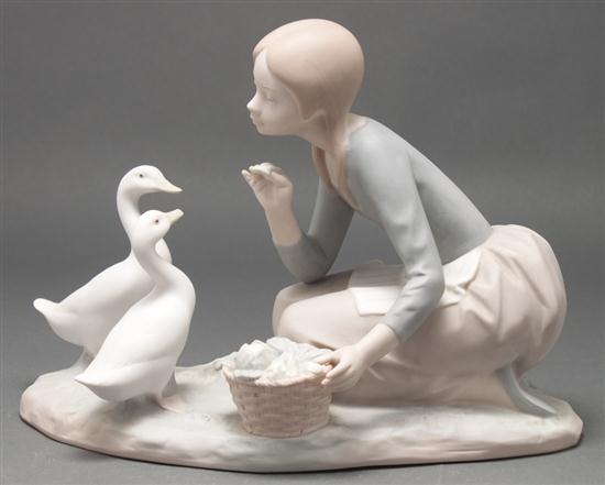 Lladro bisque figural group of a